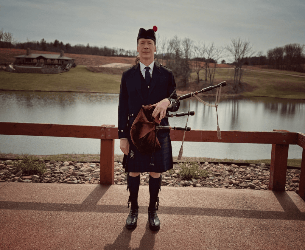 kendall giles with bagpipes at the preserve